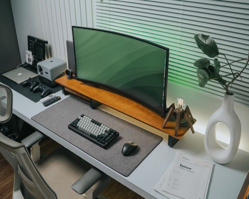 Organized home office desk with proper monitor distance